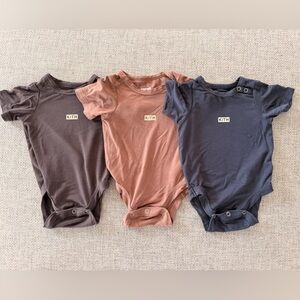 Kith Baby Onsie in Brown, Tan, and Gray